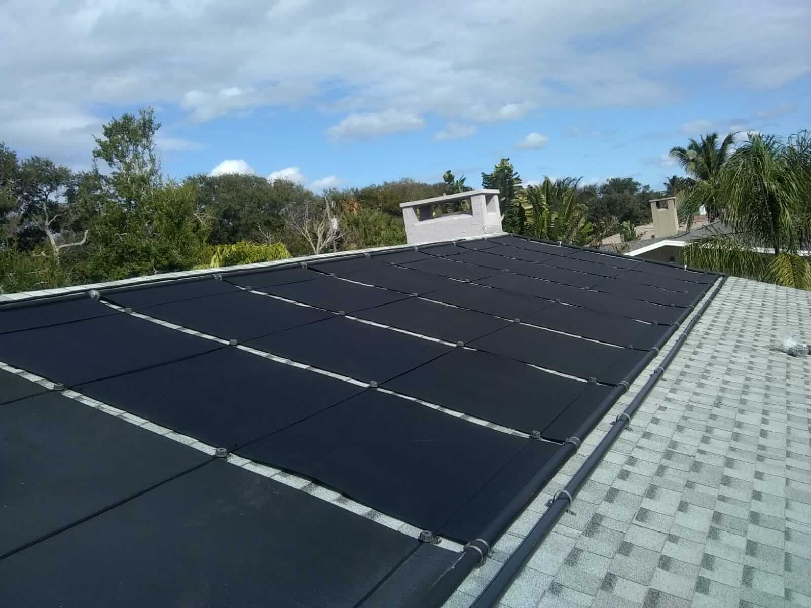 Sunsplash solar pool heating panel on roof